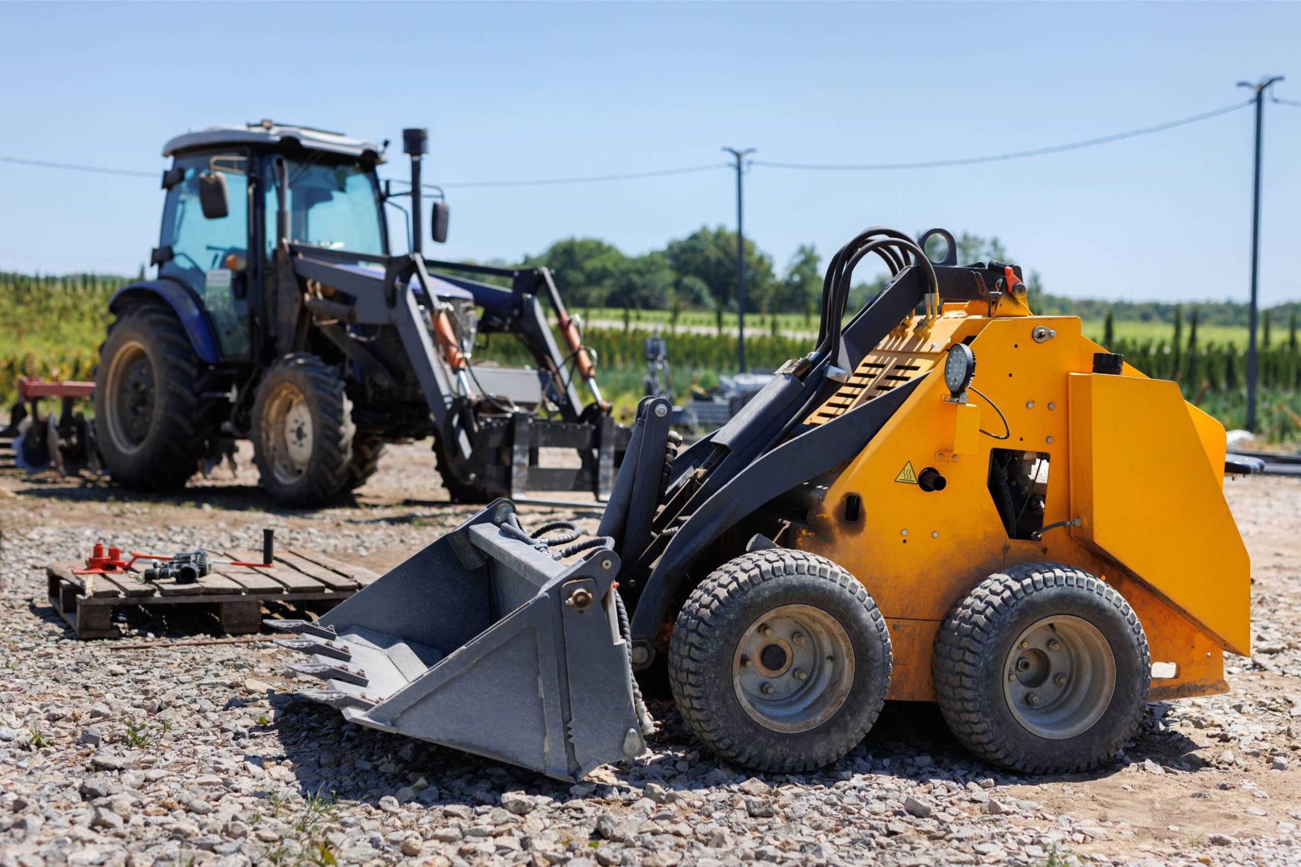 a-small-tractor-with-a-bucket-for-moving-soil-tur-2025-01-10-20-38-56-utc